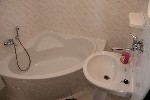 Koupelna s rohovou vanou 