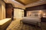 Hotelový pokoj s manželskou postelí 
