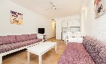 Apartmá s výhledem na moře - kuchyŃský kout s obývací částí