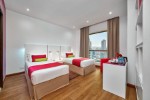 Hotelový pokoj s oddělenými postelemi