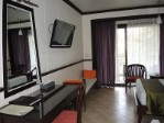 Thajsko, Pattaya a okolí - Pinnacle Grand Jomtien Resort & Spa - pokoj