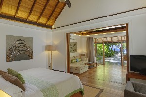Spacious beachfront villa with sunrise views.