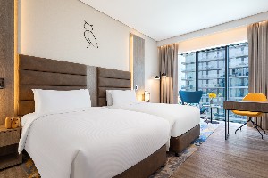 Indulgent room with partial sea views.