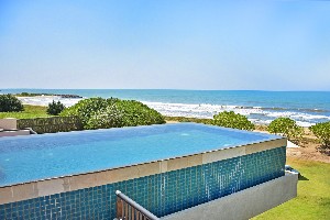 Includes rooftop infinity pool with large terrace.