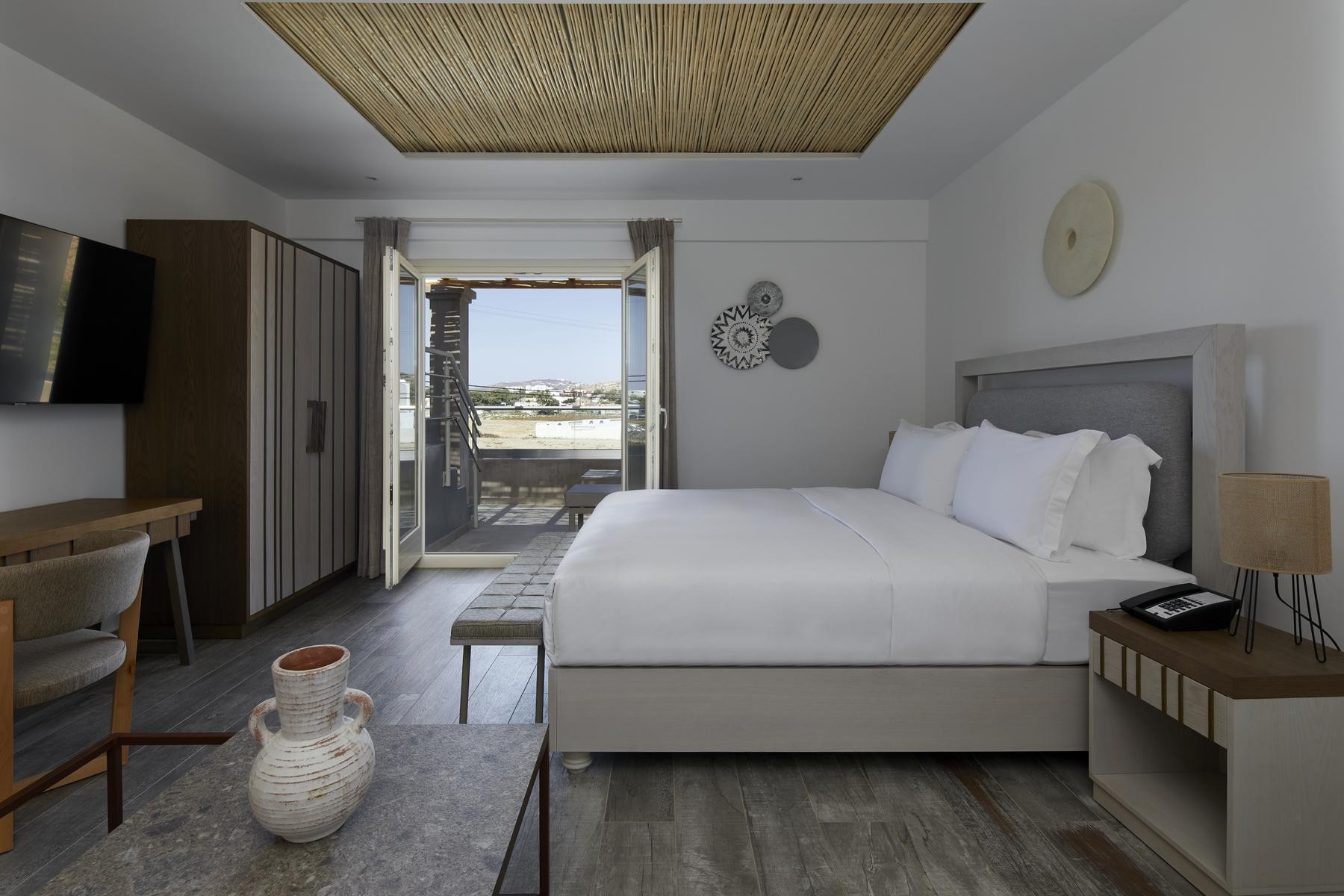 Sea Breeze Santorini Beach Resort, Curio Collection by Hilton